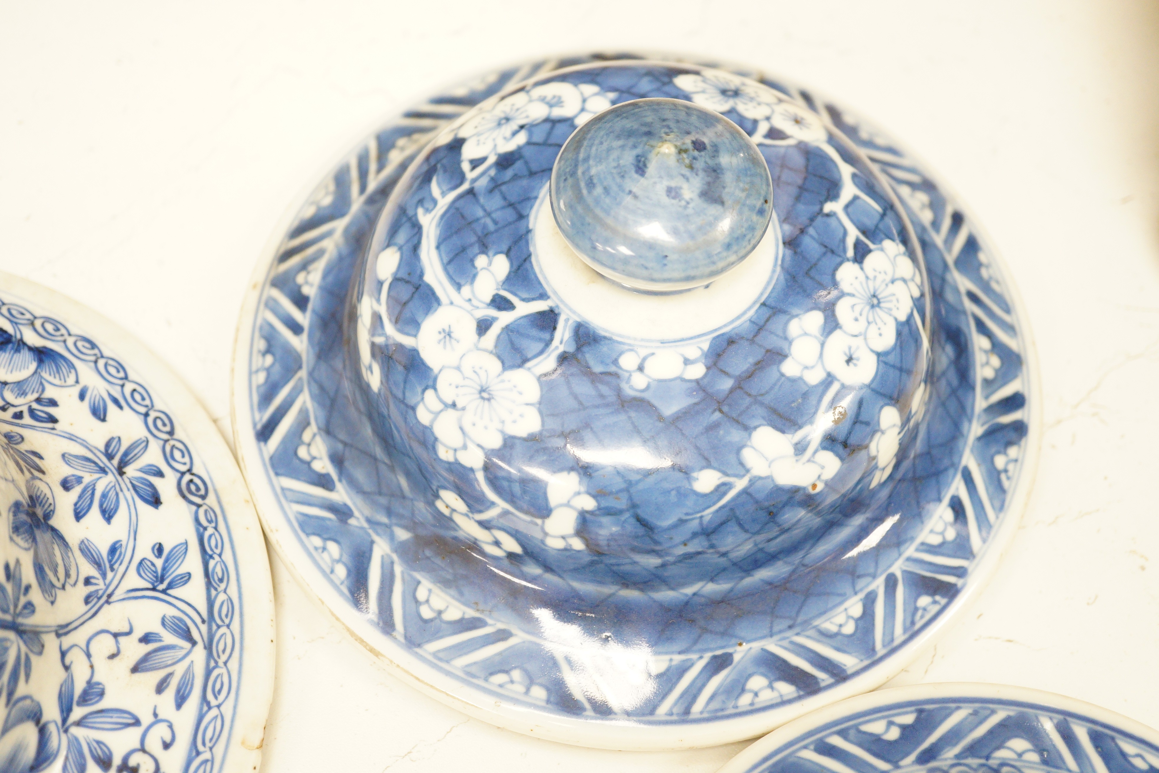 Six Chinese Kangxi blue and white vases and jar covers, largest 21.5cm diameter., Provenance - D.C.Monk & Son, former dealers based in Kensington Church Street, London W8